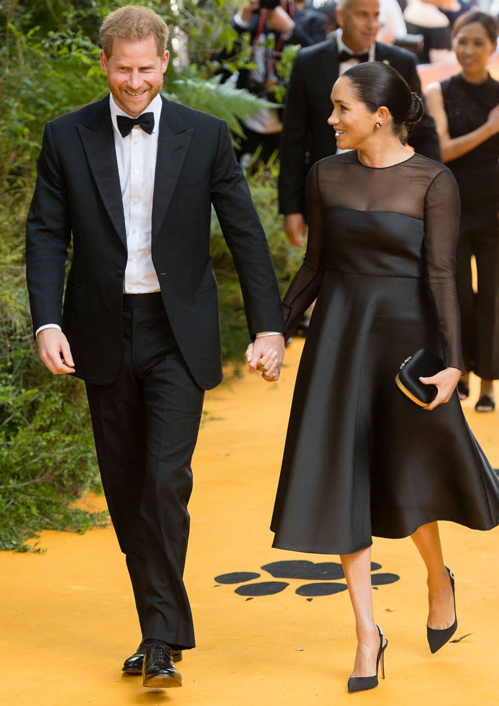 Prince Harry, Duke of Sussex and Meghan, Duchess of Sussex Lion King Premiere Public Relationship