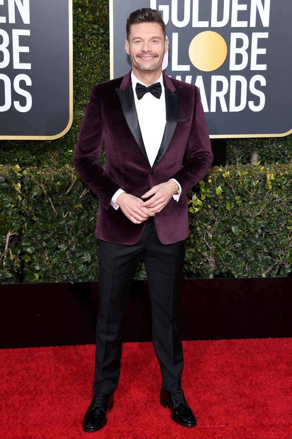 Ryan Seacrest Golden Globes Purple jacket Black Red Carpet Event Next Bachelor