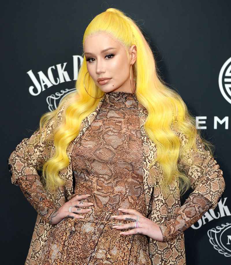 Iggy Azalea with yellow hair attends the 12th annual Mo Landy x EMPIRE Radio appreciation brunch Taylor Swift vs Scooter Braun
