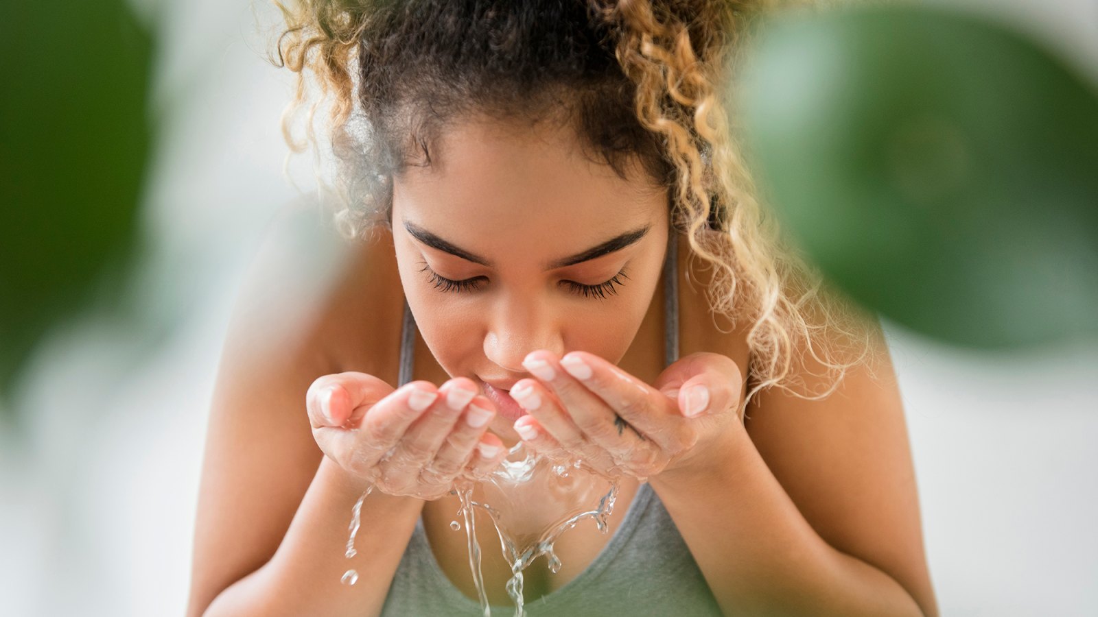 Woman Washing Face