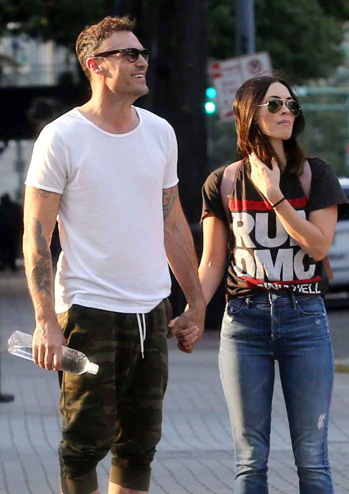 Brian Austin Green Initially Turned Down Wife Megan Fox Wearing a 'Run DMC - Raising Hell' T-shirt, With Blue Jeans, while Brian Wearing a White T-Shirt, Camouflage Jogging Short Pants