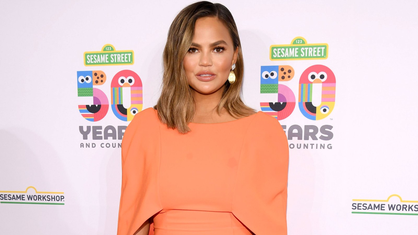 Chrissy Teigen Says Her Lips Are 'Going to Explode' as She Has Reaction to Altitude Sickness