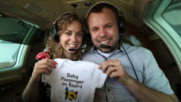 John David Duggar Wife Abbie Burnett Pregnant Baby Announcement Plane Onesie