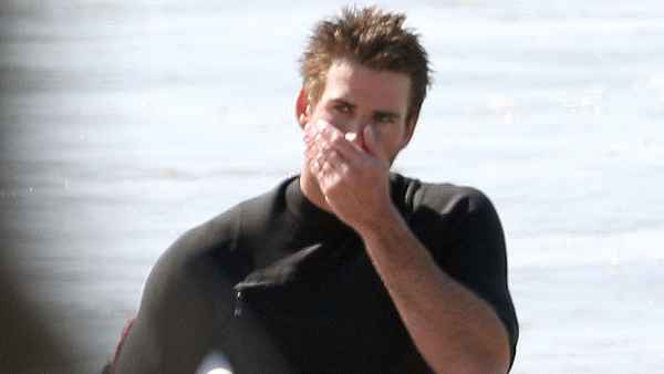 Liam Hemsworth Goes Surfing With Brother Chris After Miley Cyrus Split