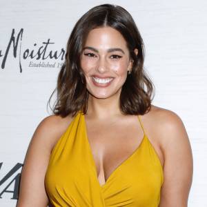 Pregnant Ashley Graham Naps and Cradles Bare Baby Bump