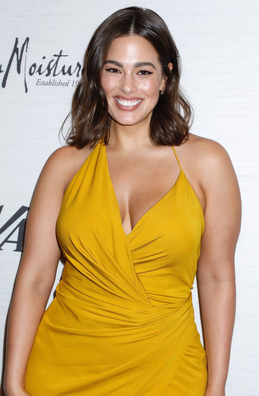 Pregnant Ashley Graham Naps and Cradles Bare Baby Bump