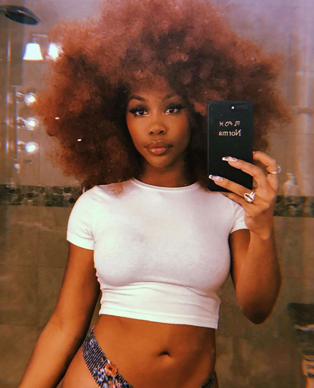 Celebs With Curly Hair: Perms, Spirals, Natural Coils Hair Trend