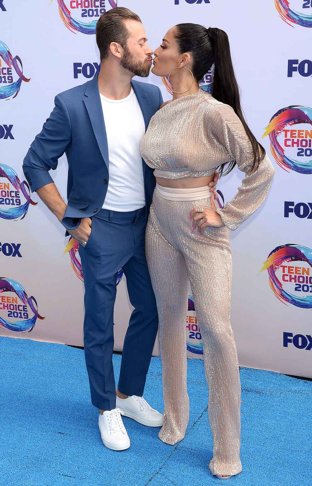 Artem Chigvintsev and Nikki Bella Kissing