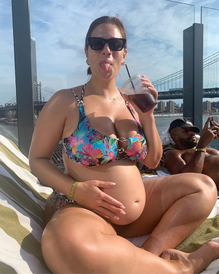 Ashley Graham Embraces Her Bare Baby Bump During 'Staycation' With Husband Justin Ervin