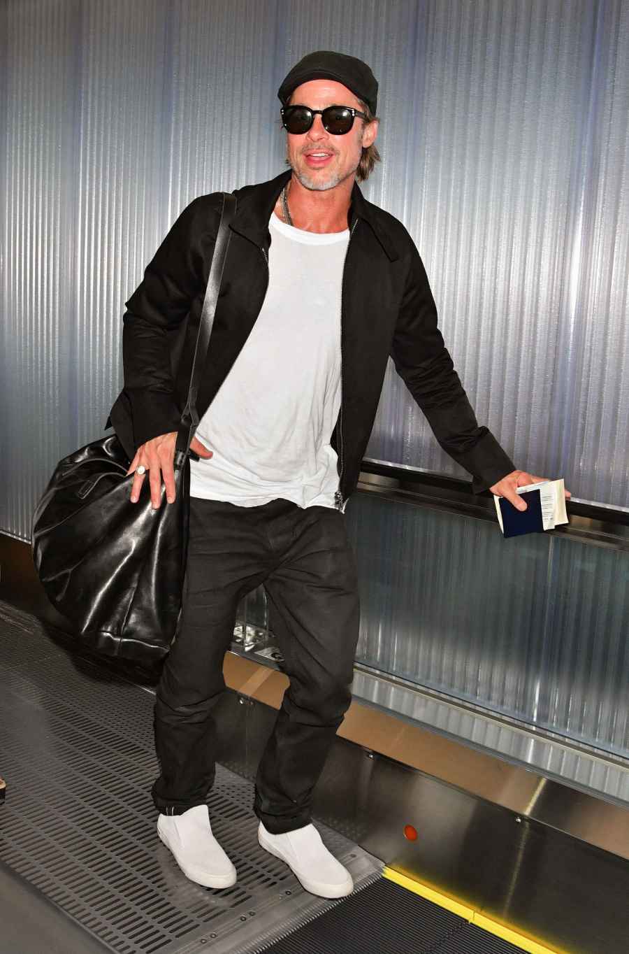 Brad Pitt Is All Smiles Arriving in Japan After Son Maddox's Comments About Their Tense Relationship