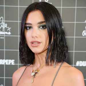 Dua Lipa Stills Loves Her First Tattoo