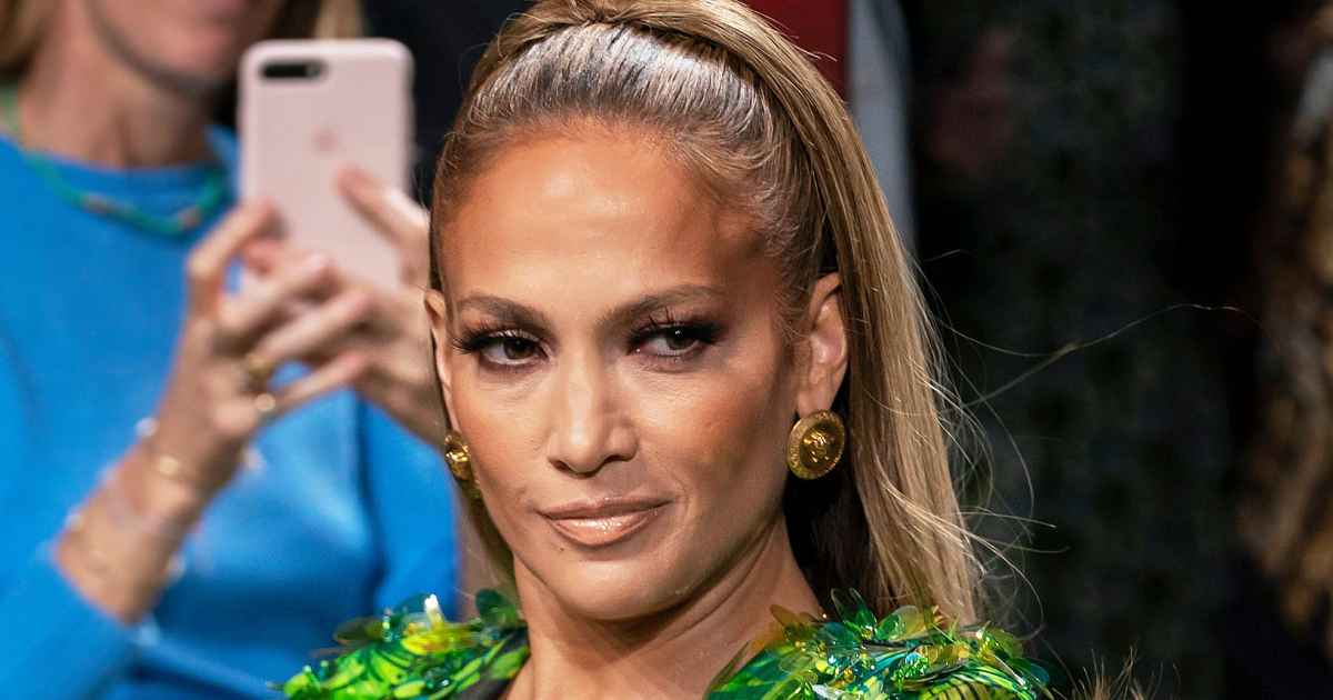 Jennifer Lopez Wears Green Versace Dress During 'SNL' Performance | Us Weekly Jennifer Lopez Wears Green Versace Dress During 'SNL' Performance | Us Weekly