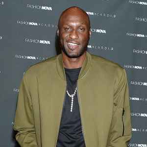 Lamar Odom Green Jacket Rob Kardashian and Kourtney Kardashian Good With His Kids