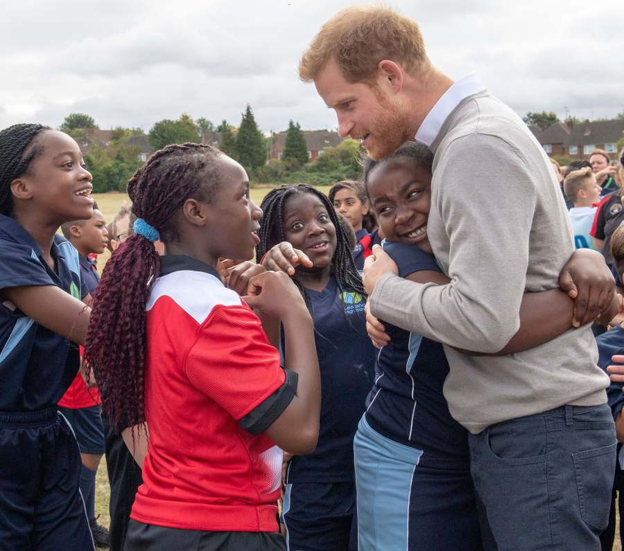 Prince Harry Gives Hugs