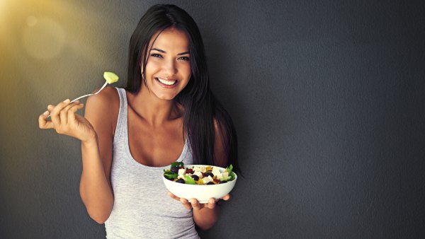 Girl eating a salad