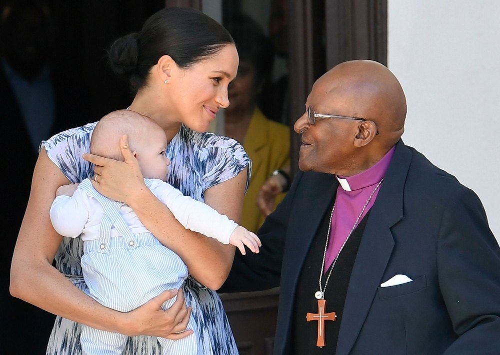 Meghan Duchess of Sussex, holding her son Archie Harrison Mountbatten-Windsor, meets Archbishop Desmond Tutu