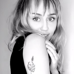 Miley Cyrus and Cody Simpson New Tattoos