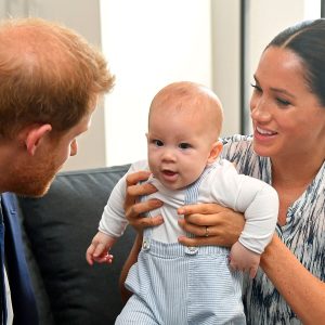 Prince Harry and Meghan Duchess of Sussex, holding their son Archie Harrison Mountbatten-Windsor