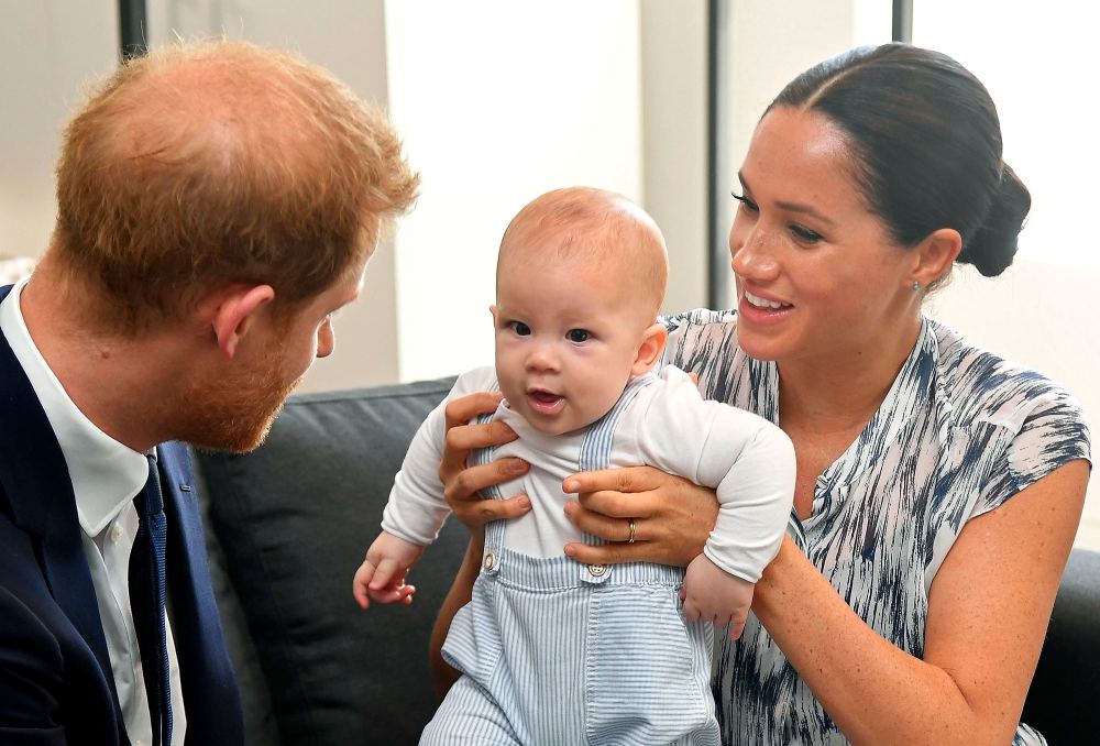 Prince Harry and Meghan Duchess of Sussex, holding their son Archie Harrison Mountbatten-Windsor