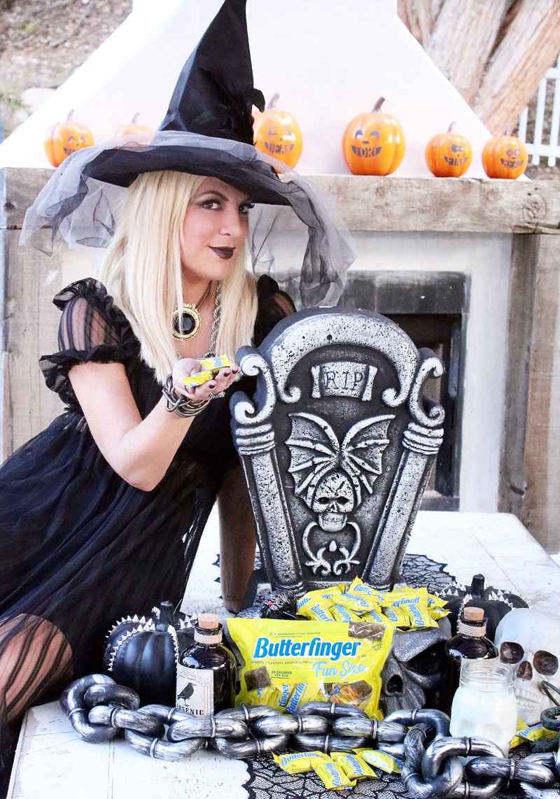 Tori Spelling Dressed as a Witch for Halloween with Butterfinger Candy