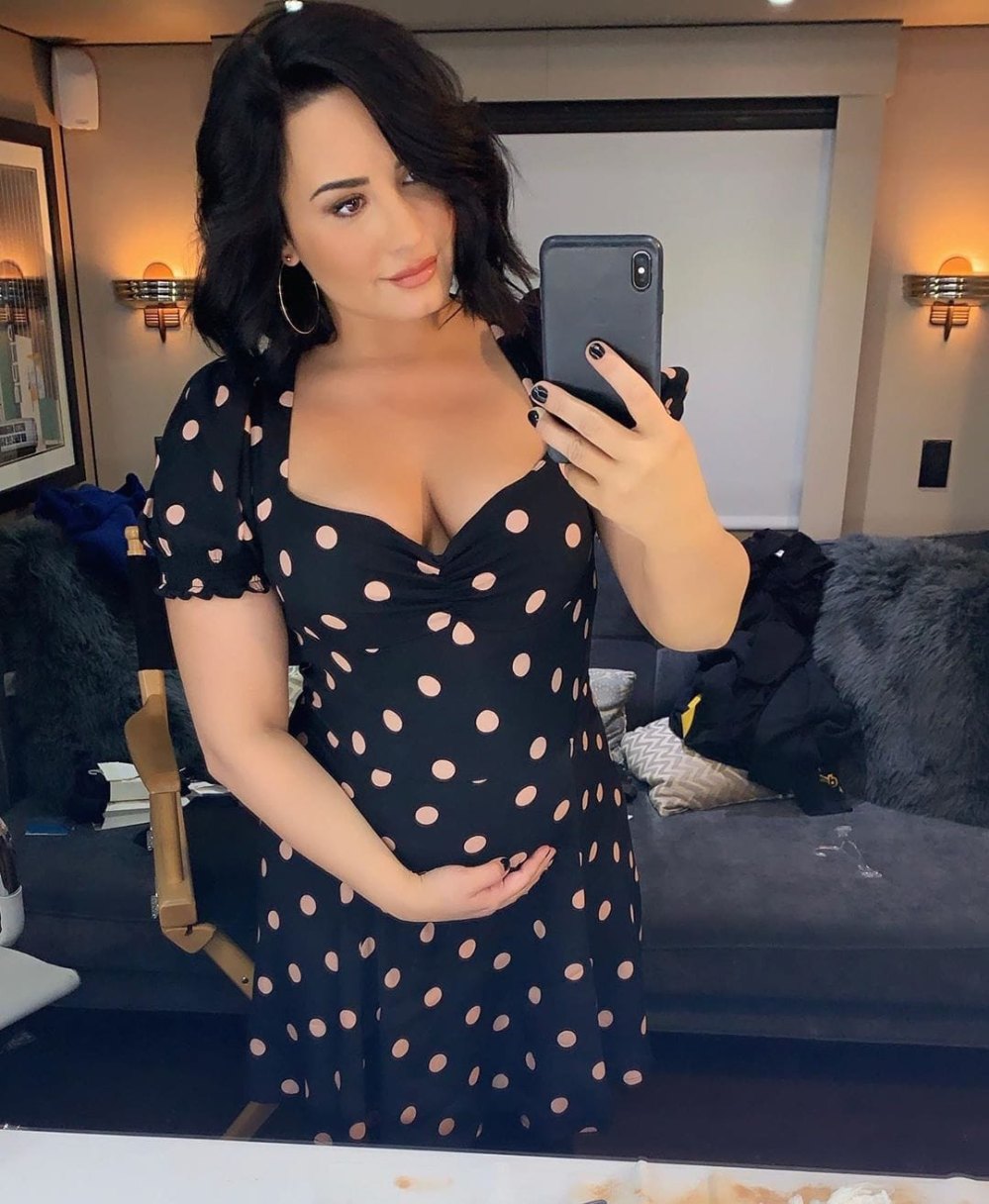 Demi Lovato Cradles Baby Bump for 'Will & Grace'
