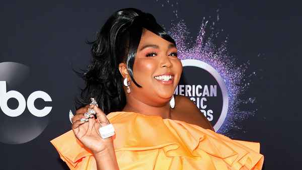 Lizzo Carries Tiny Valentino Purse at AMAs 2019