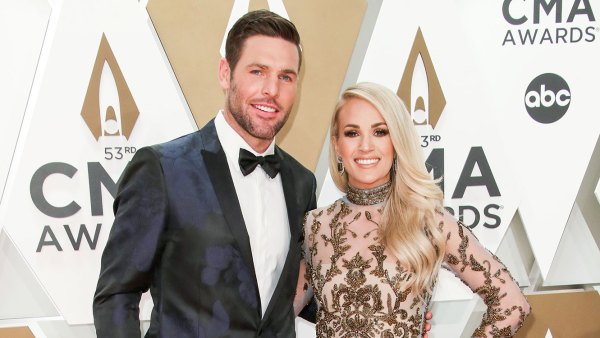 Mike Fisher and Carrie Underwood PDA Arrival Red Carpet 2019 CMA Awards