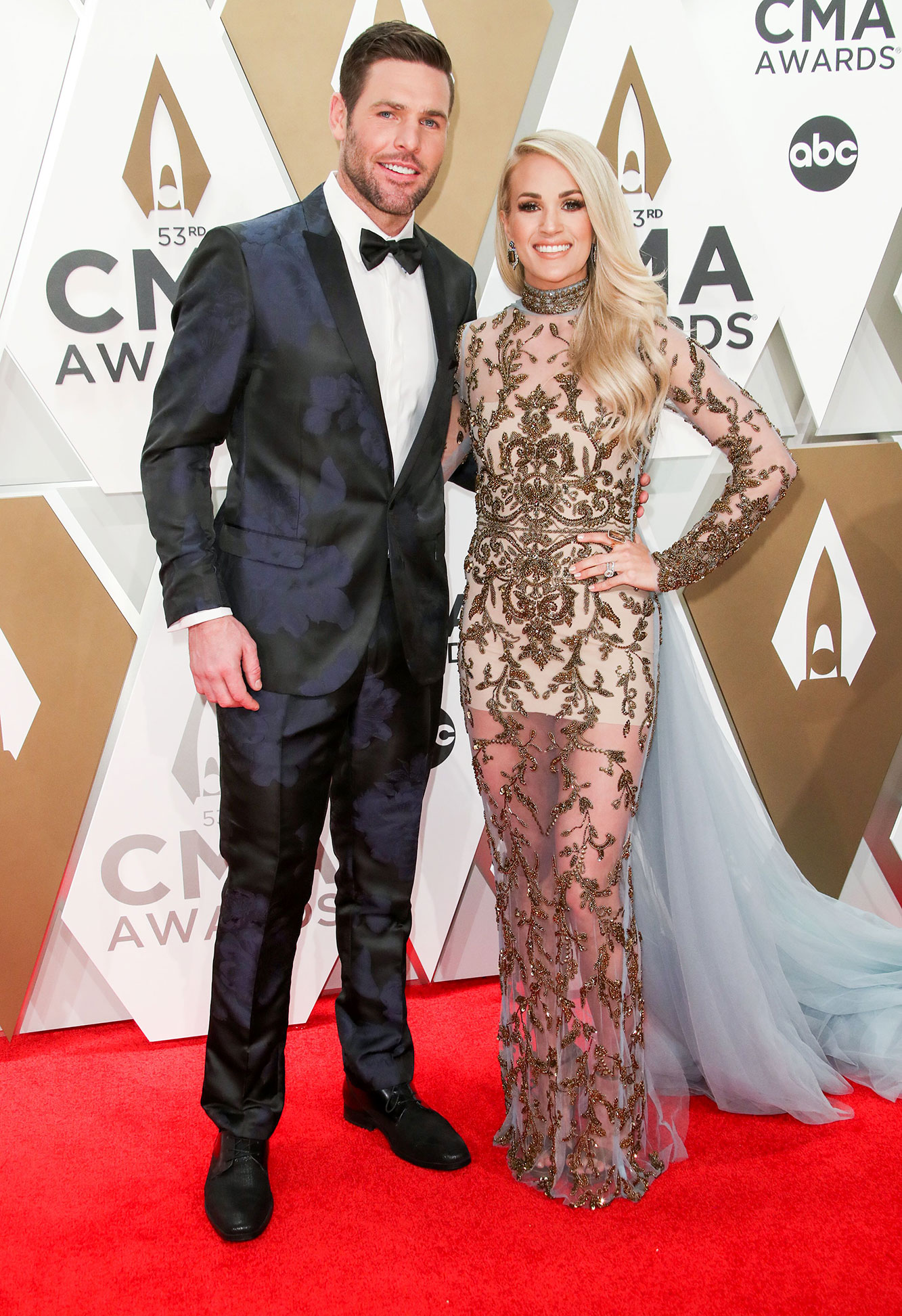 Mike Fisher and Carrie Underwood PDA Arrival Red Carpet 2019 CMA Awards