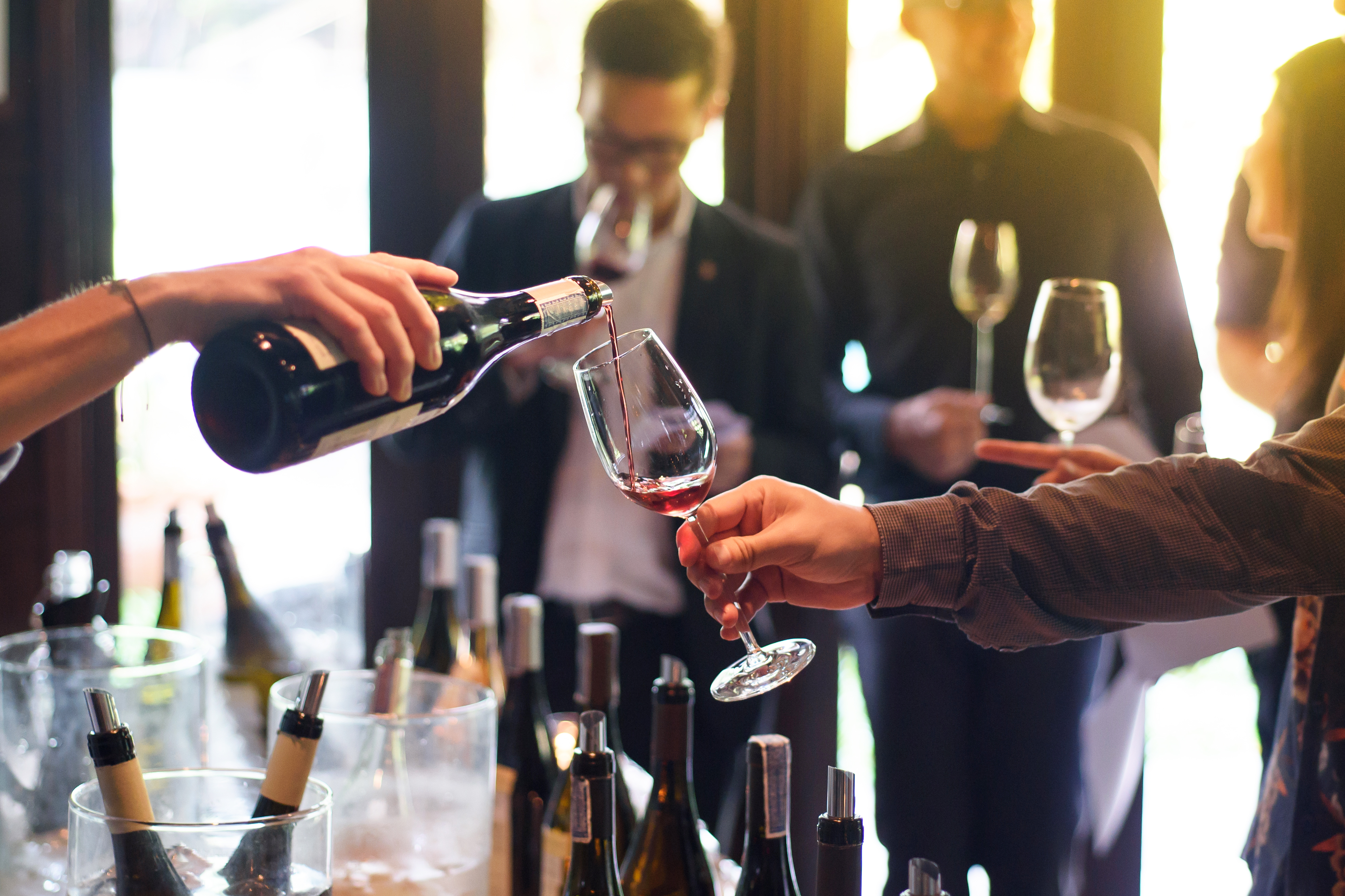 Wine being poured at party
