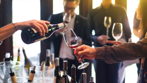 Wine being poured at party