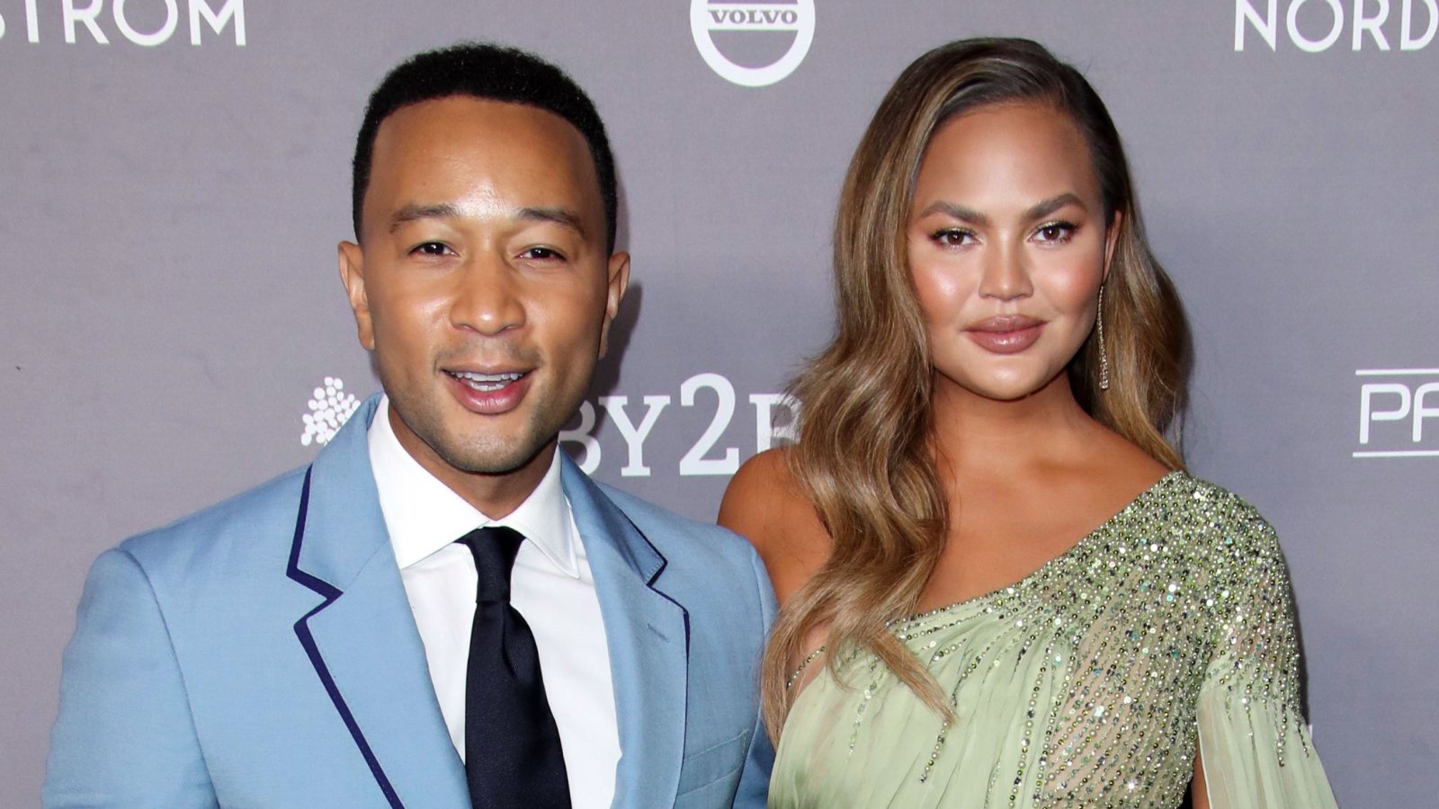 Chrissy Teigen Falls in Hilarious Ice Skating Video With John Legend