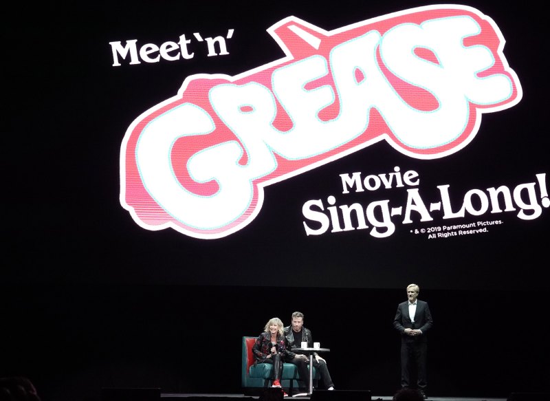 John Travolta and Olivia Newton-John Reprise 'Grease' Roles in Full-On Costumes