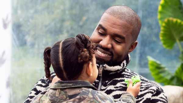Kim-Kardashian-Shares-Rare-Photo-of-Kanye-West-Smiling-With-Kids-at-Son-Saint’s-Birthday-Party-2