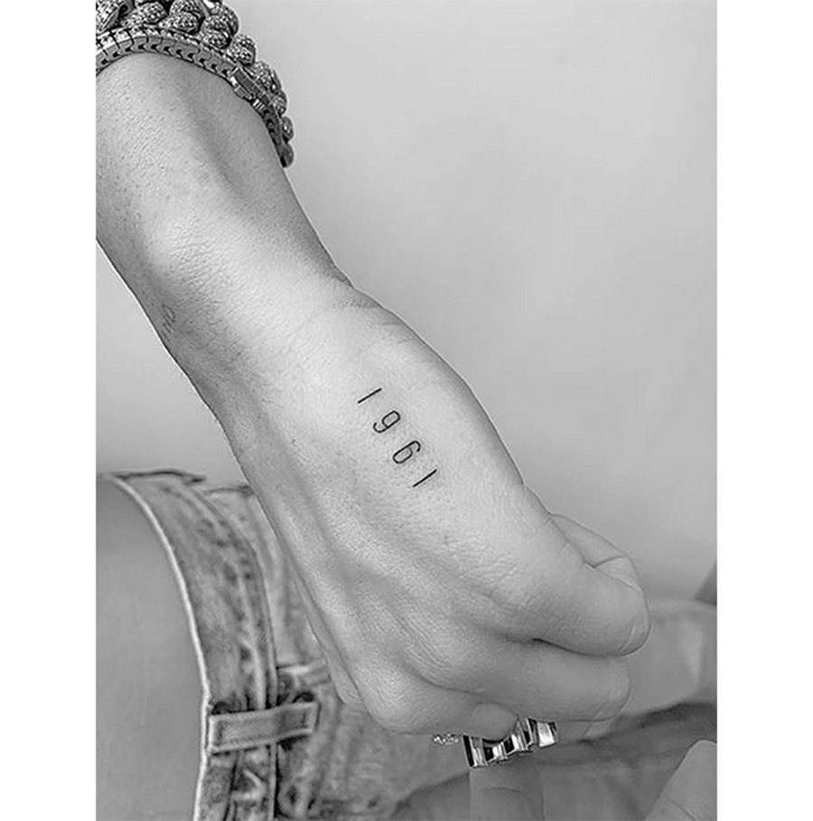 Miley Cyrus Post Divorce Tattoos - 1961