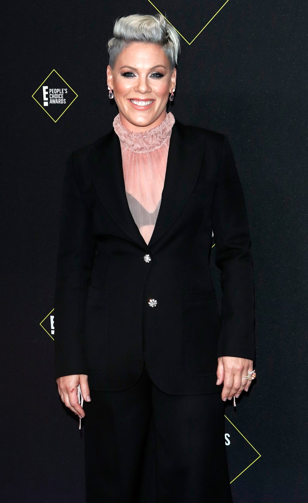 Pink Wields a Champagne Gun During Ski Vacation With Her Family