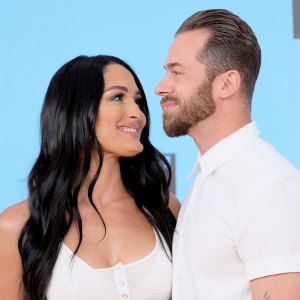 Artem-Chignitsev-Cradles-Pregnant-Nikki-Bella’s-Baby-Bump