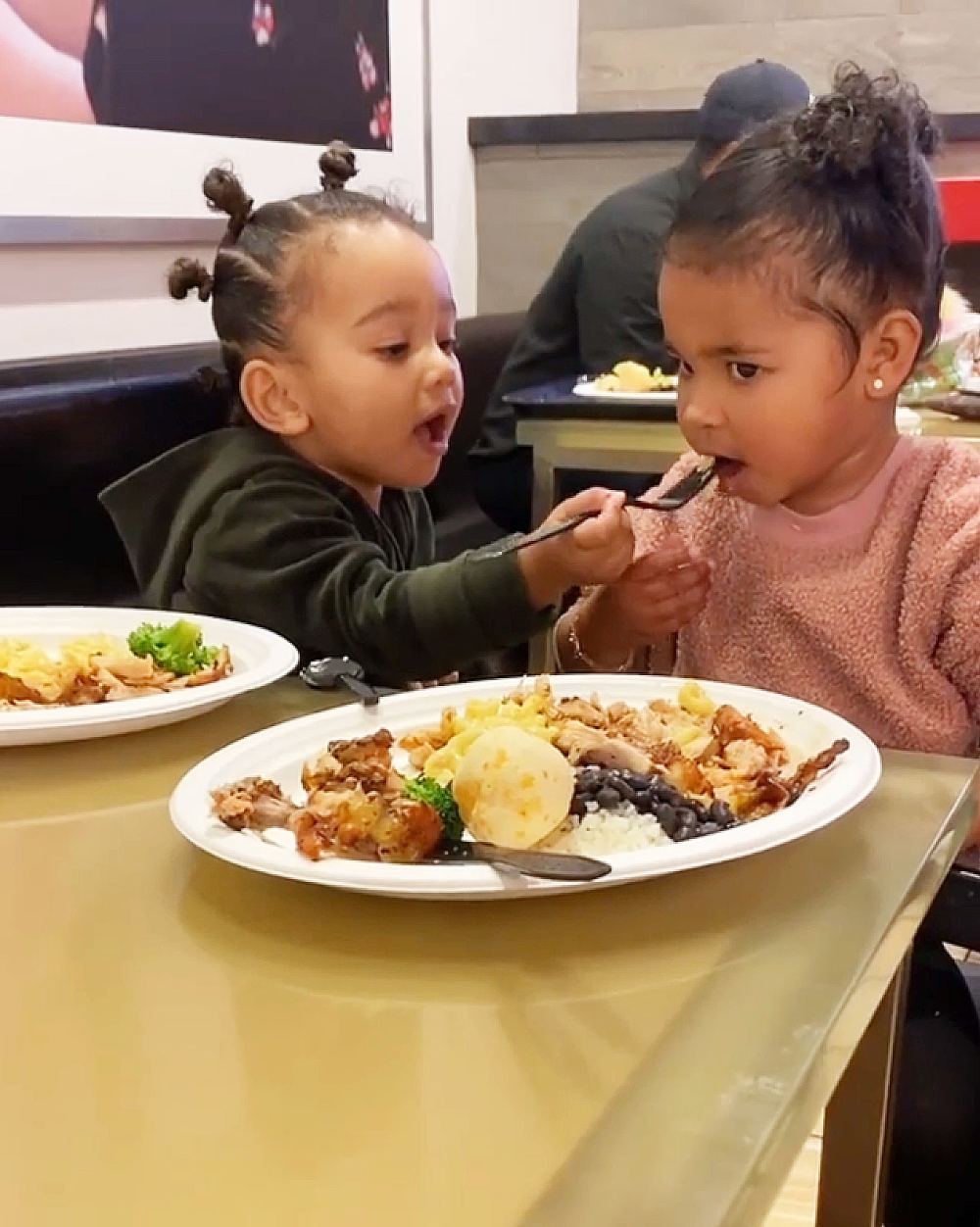 Kim Kardashians Daughter Chicago West Feeds Cousin True Thompson During Target Outing