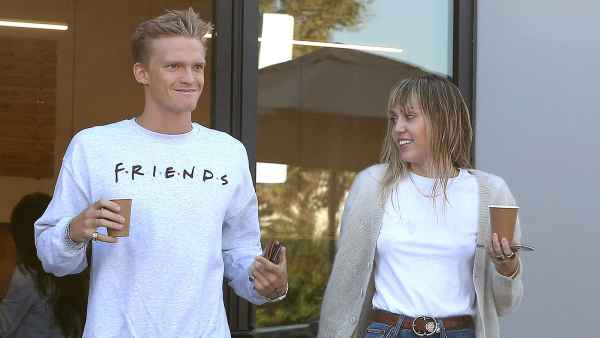 Miley Cyrus and Cody Simpson Holding Coffee Baby Plans
