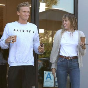 Miley Cyrus and Cody Simpson Holding Coffee Baby Plans