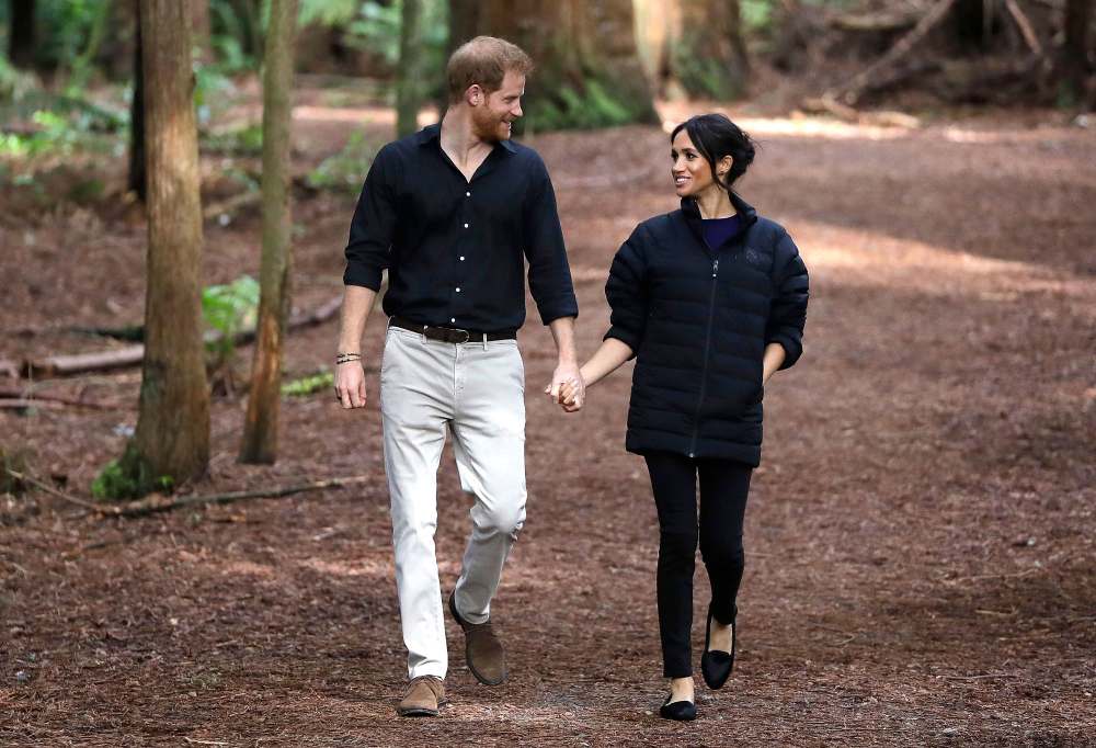 Prince Harry and Meghan Duchess of Sussex Walk Through a Redwoods Forest