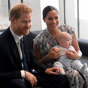 Prince Harry and Meghan Markle Duchess of Sussex Holding Archie