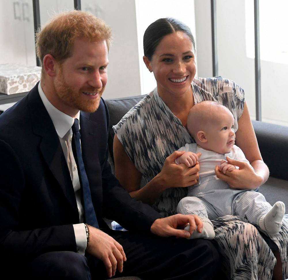Prince Harry and Meghan Markle Duchess of Sussex Holding Archie