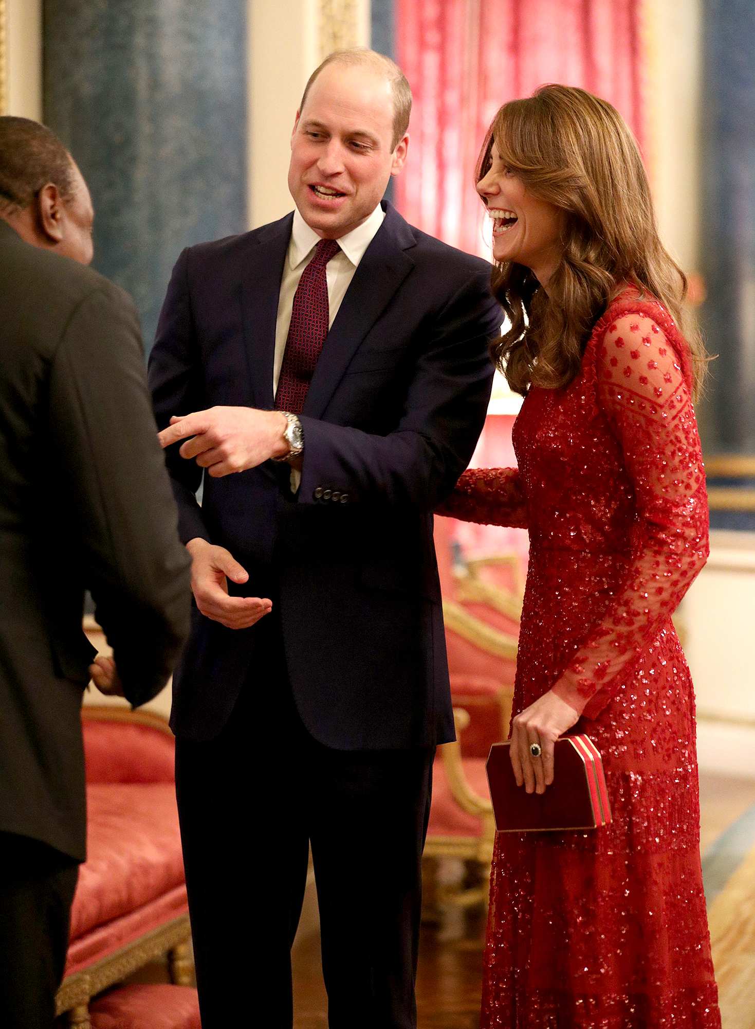 Le prince William et la duchesse Kate sourient lors d'un événement au palais de Buckingham | Us Weekly