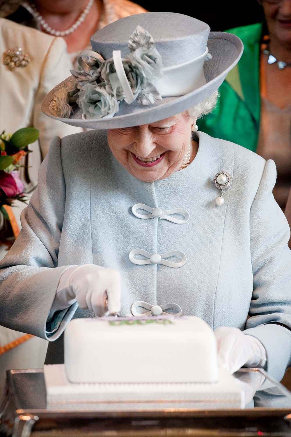Queen Elizabeth II Cutting Cake