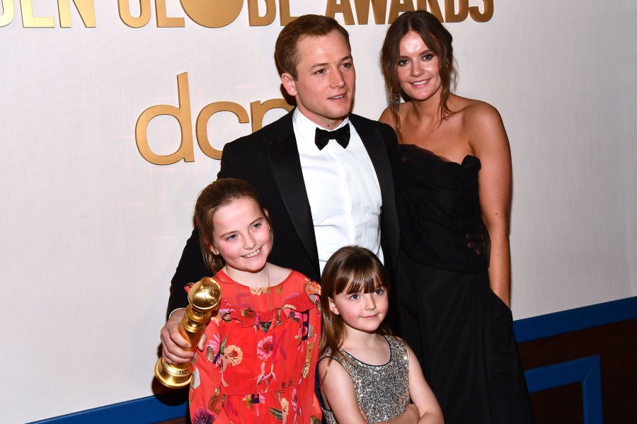 Taron Egerton with sisters Mary and Rosie and Emily Thomas Family Golden Globes 2020