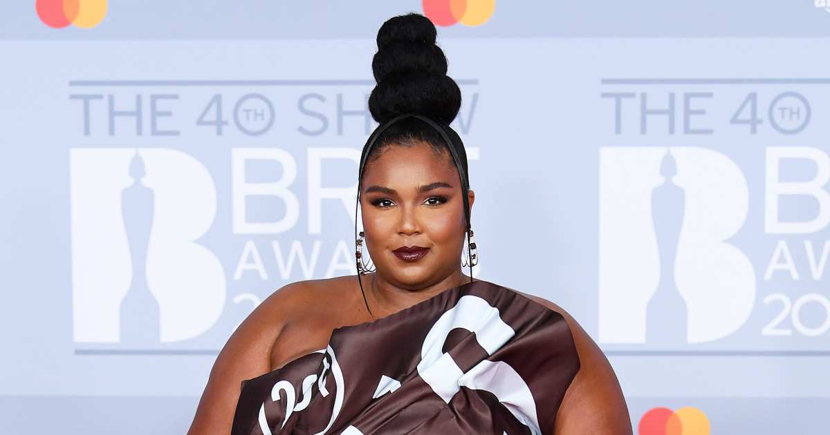 lizzo backless dress Lizzo Declares It a 'Back Fat Summer' as She Proudly Flaunts Her Curves in Slinky Metallic Dress