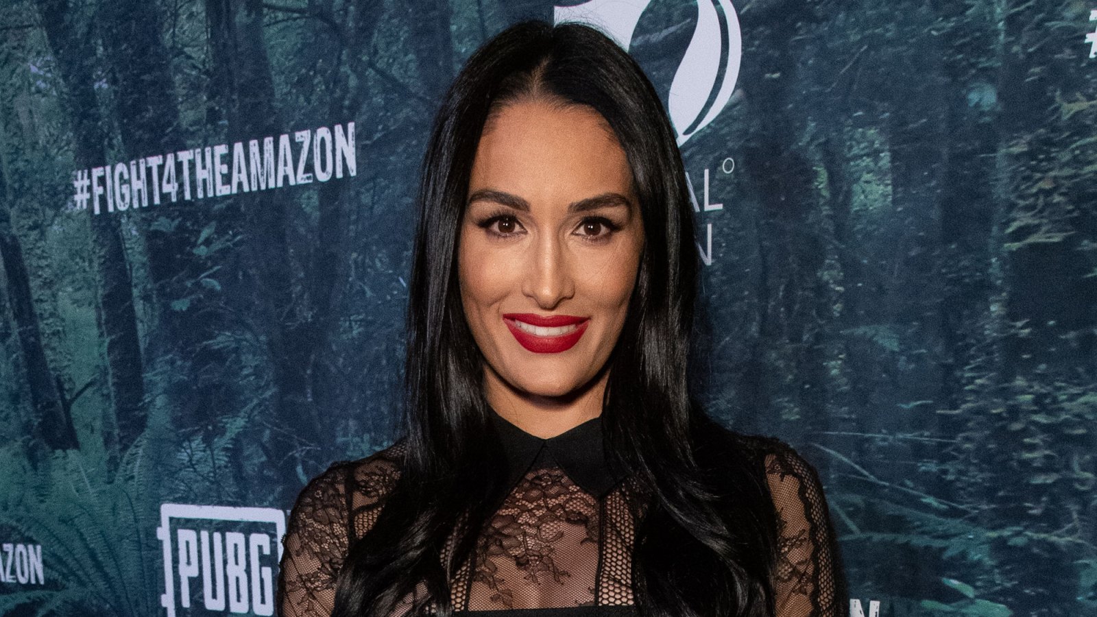 Nikki Bella Shows Off Pregnancy Curves I’m Fitted Black Dress: ‘My Bump Has Gotten So Much Bigger’