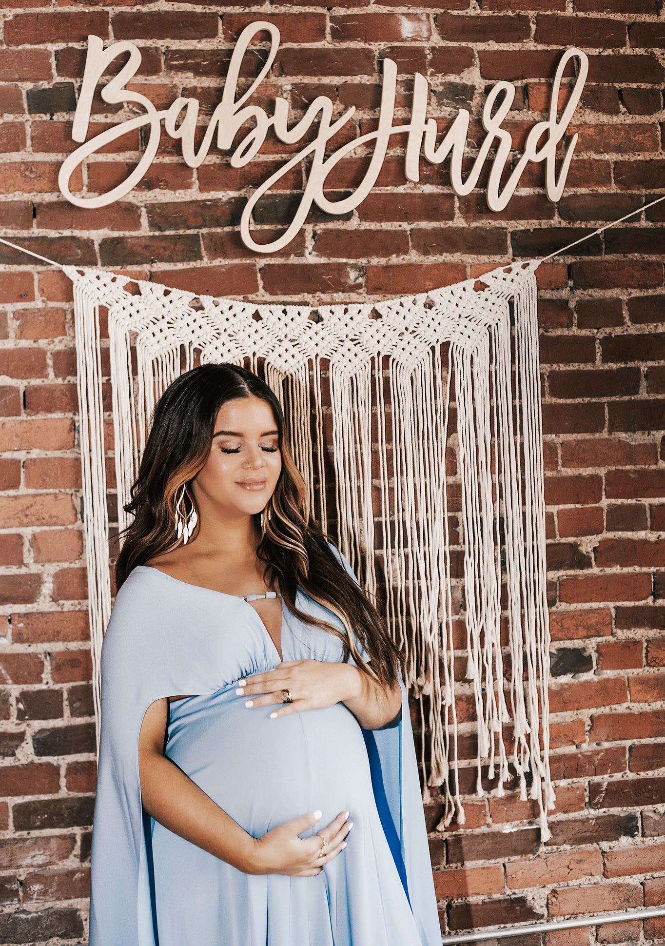 Pregnant Maren Morris Cradles Her Bump in Angelic Photos From Baby Shower