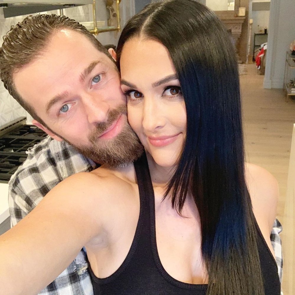 Pregnant Nikki Bella Flips the Switch in Her Old Wrestling Outfit in Tik Tok With Artem Chigvintsev