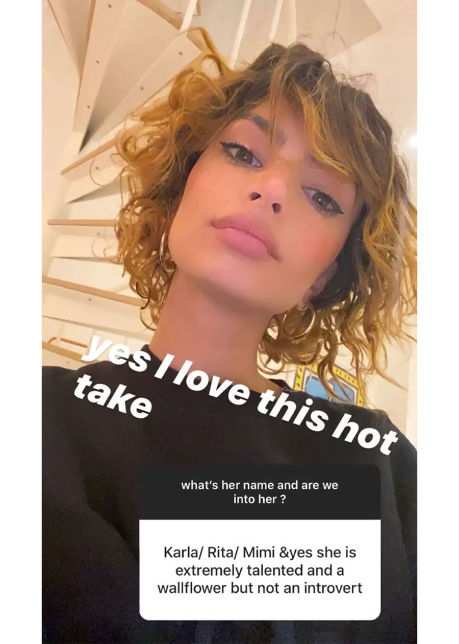 EmRata Poses in a Short, Curly Wig